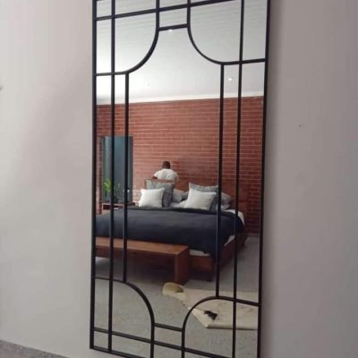 Large black steel art deco grid frame designer mirror in bedroom — Mirror Art Gallery