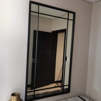 Black steel multi-panel grid frame designer mirror in entrance hall — Mirror Art Gallery JHB
