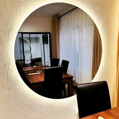 Round LED backlit frameless designer mirror in dining room — Mirror Art Gallery JHB Johannesburg